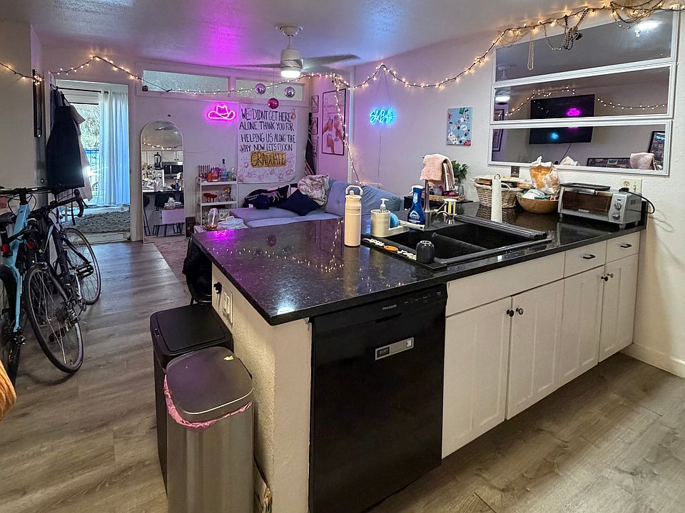 Kitchen, living room, upstairs bedroom with balcony