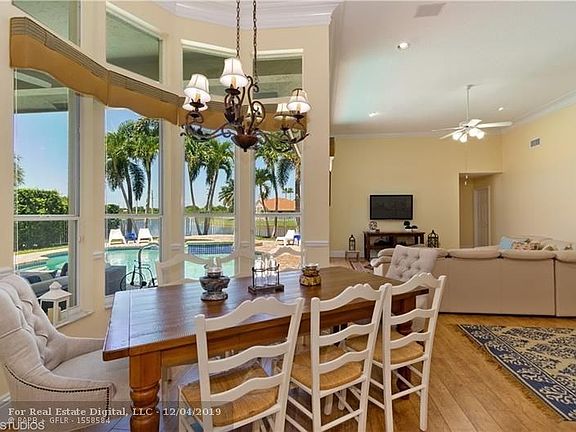 Breakfast nook with gorgeous views.  Window treatments include shades for privacy (not shown here)