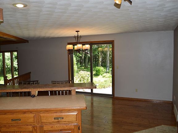 Looking into dining and kitchen from great room.