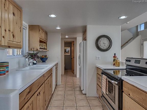 Updated kitchen with knotty pine cabinets!