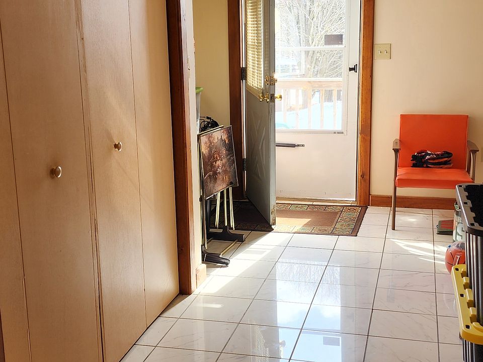 Entryway with large walk in closet