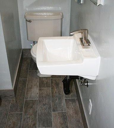 Porcelain wood-like floors, new faucet and sink