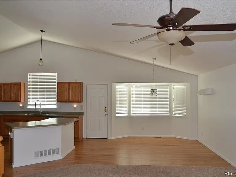 6123 S Quemoy Way — Photo 7