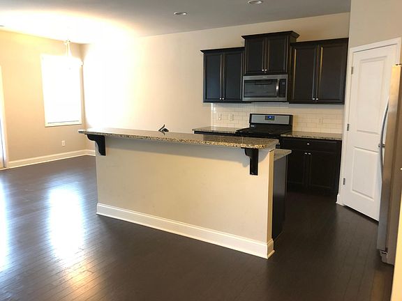 Bar long enough for 4 stools