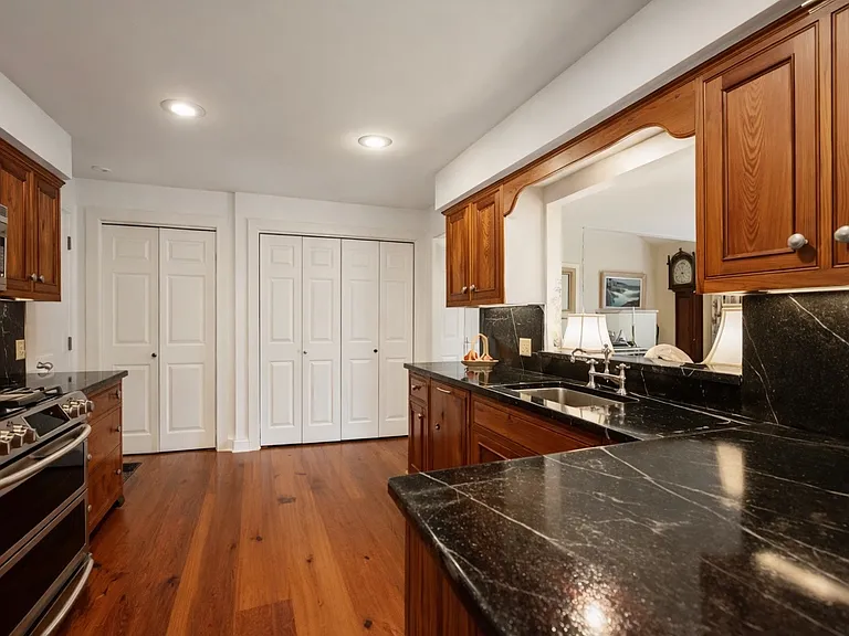 Kitchen with pass-through to living room