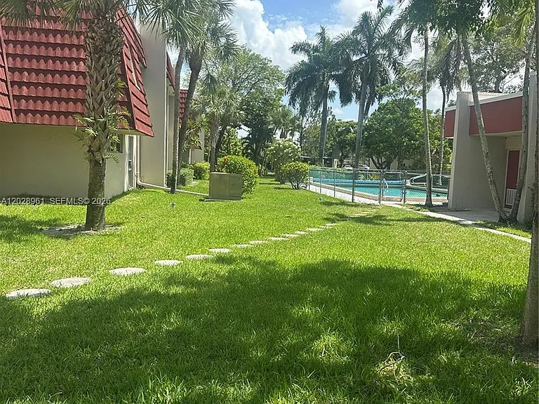 5 Jacaranda Country Club Dr #206 — Photo 1