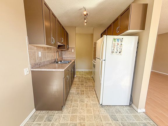 2nd image of 10815 83rd Ave NW Unit 306