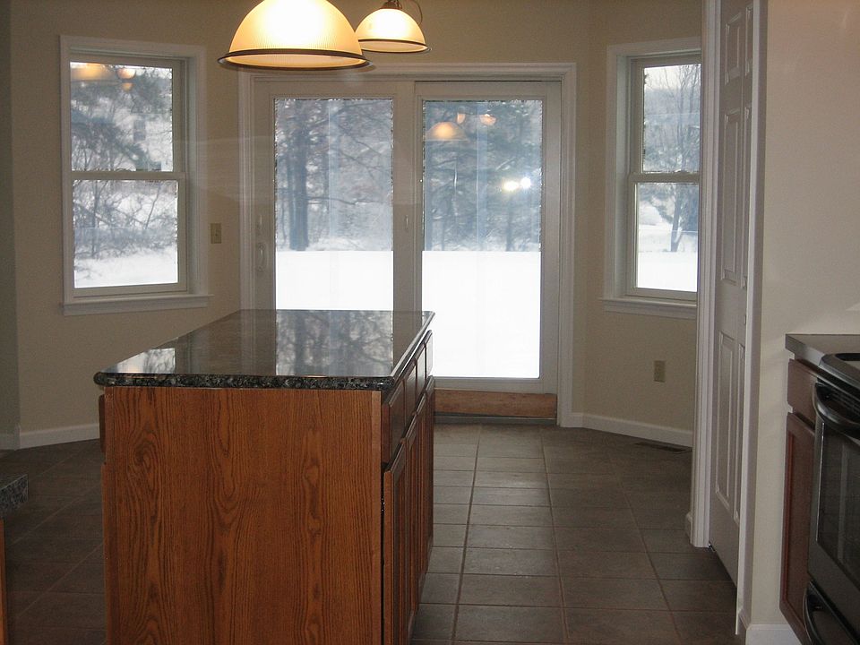 tiled kitchen w/granite work island