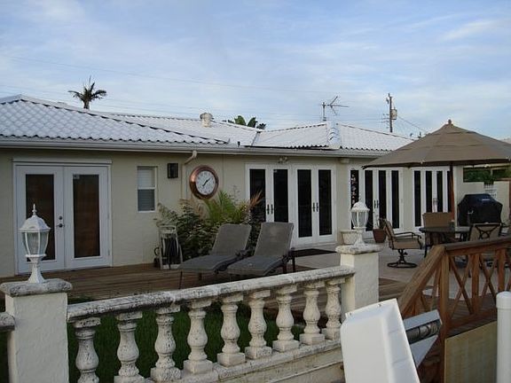 View of rear of home from boat