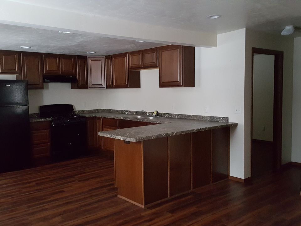Kitchen with bedroom doorway