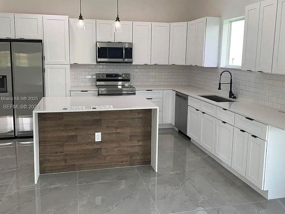 1st image of 655 NW 24th Ave #0