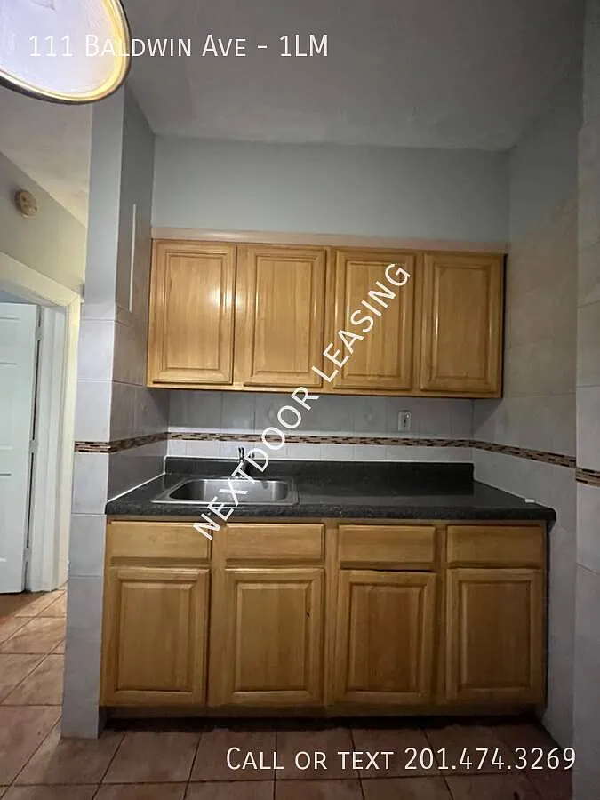 111 Baldwin Ave — Photo 1