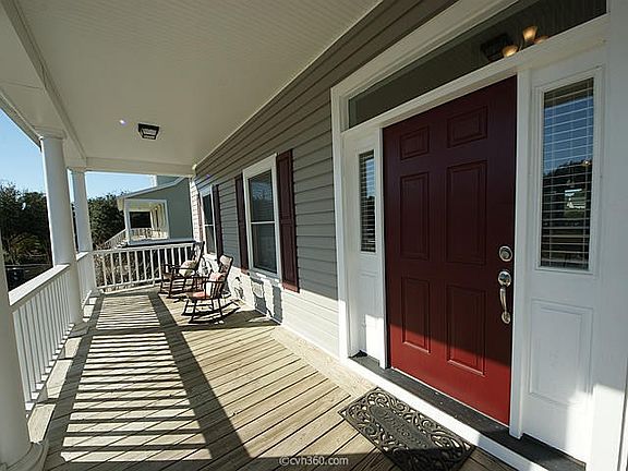 VIEW OF WIDE FULL LENGTH FRONT PORCH