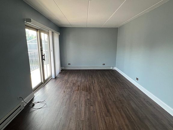 Living Room with Brand new luxury Vinyl Flooring, Freshly Painted, new Power outlets, new Blinds