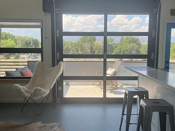 We have 2 garage doors that open the house up for awesome indoor/outdoor space. This is the one upstairs in the kitchen.