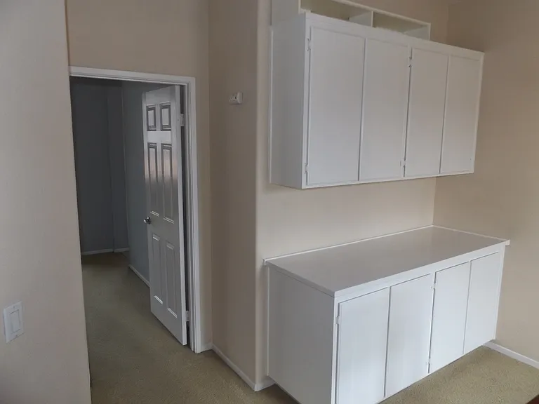 Linen closet on second story landing between bedrooms