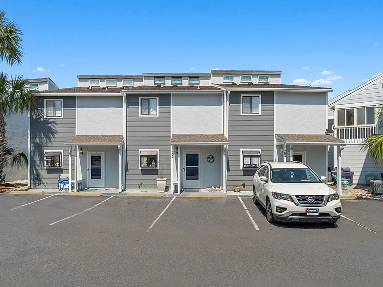 Front of the home with 2 free designated car parking for guests