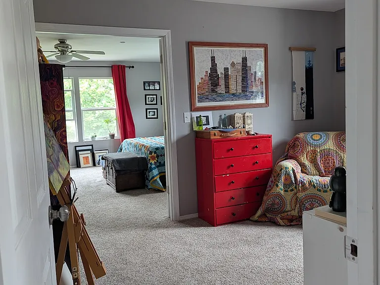 Receiving room from upstairs Living Room to Master Bedroom. Receiving room measures 13' x 10.5' and is perfect for a craft room, reading room, or nursery. French doors lead from receiving room to Master Bedroom.