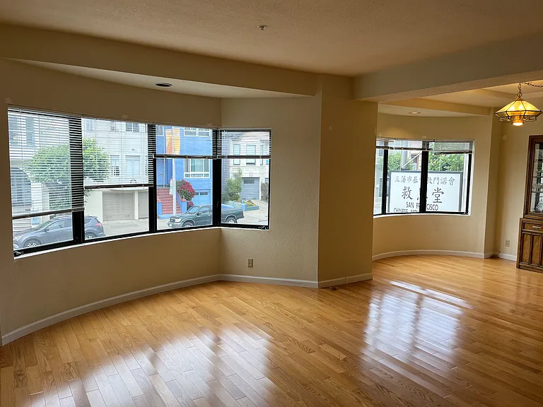 Spacious open floor plan, showing living room and front of California St