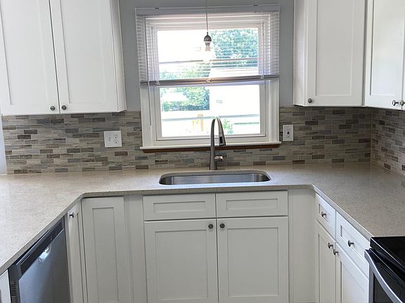 Entire kitchen remodel. Everything is new, cabinets, appliances, backsplash, sink, faucet.