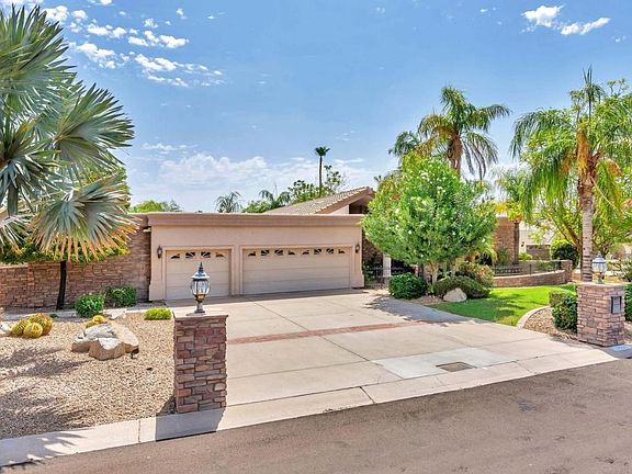 11813 S Tonalea Dr-large-003-15-Front Ex