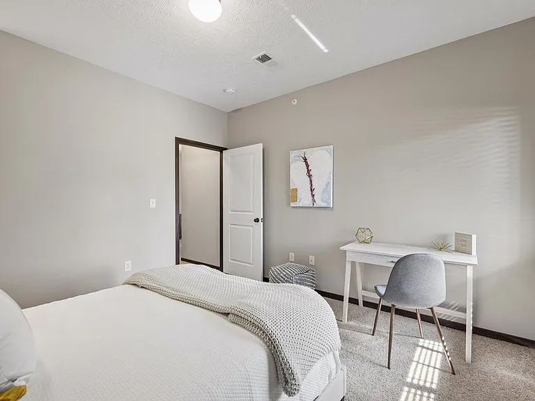 Light-filled bedrooms create a peaceful spot to rest, focus, and ease into everyday routines.