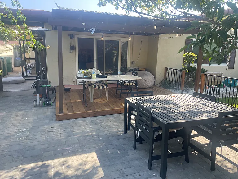 Beatiful Stonework around Redwood Deck & Trellis