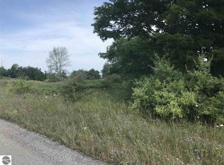 7634 Saddle Ridge Dr, Grawn, MI 49637