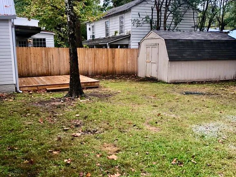 privacy fenced backyard, patio deck