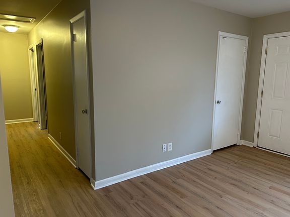 Hall to bedrooms, Coat Closet and Front Door at right