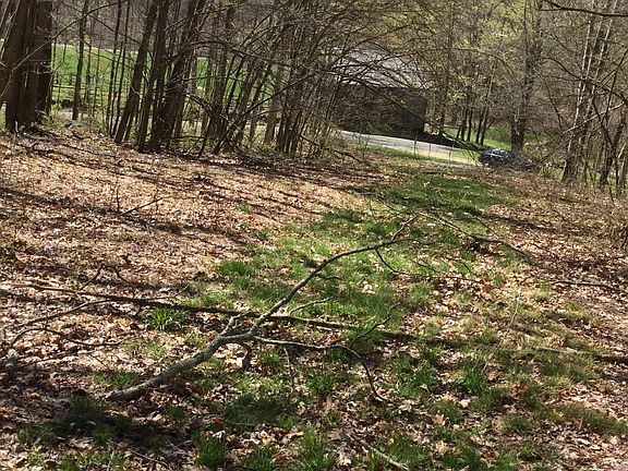 View to road with neighboring barn.