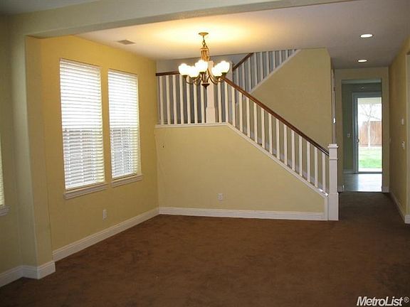 The living and dining rooms are the focal point as you enter this home.  Windows galore make this space so inviting!