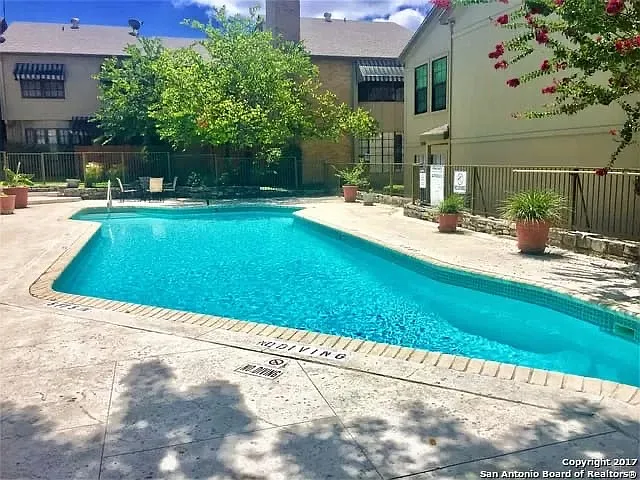 Shared condominium pool is well maintained and great for the hot summers!