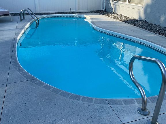 Afternoon shade on the pool.