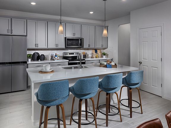 Residence 2 kitchen modeled at a nearby Meritage community.