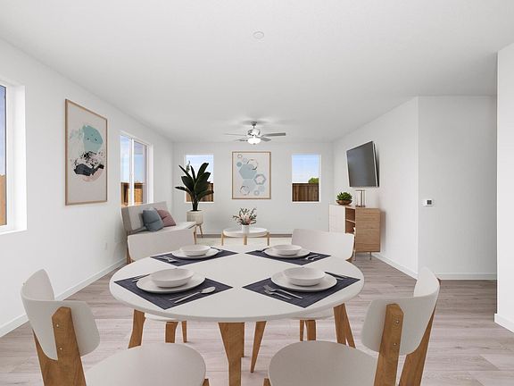 The dining room is off of the kitchen and open to the family room.