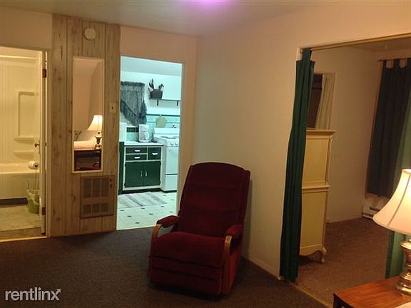 View of living room, bedroom, kitchen and bath