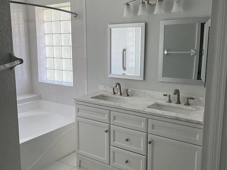 Primary bath w/ double sinks.