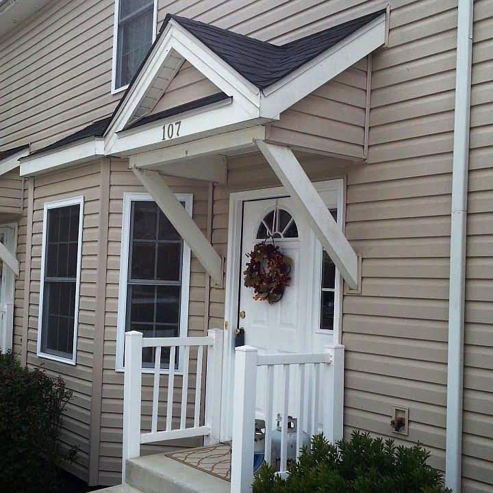 Front door, newly painted green.