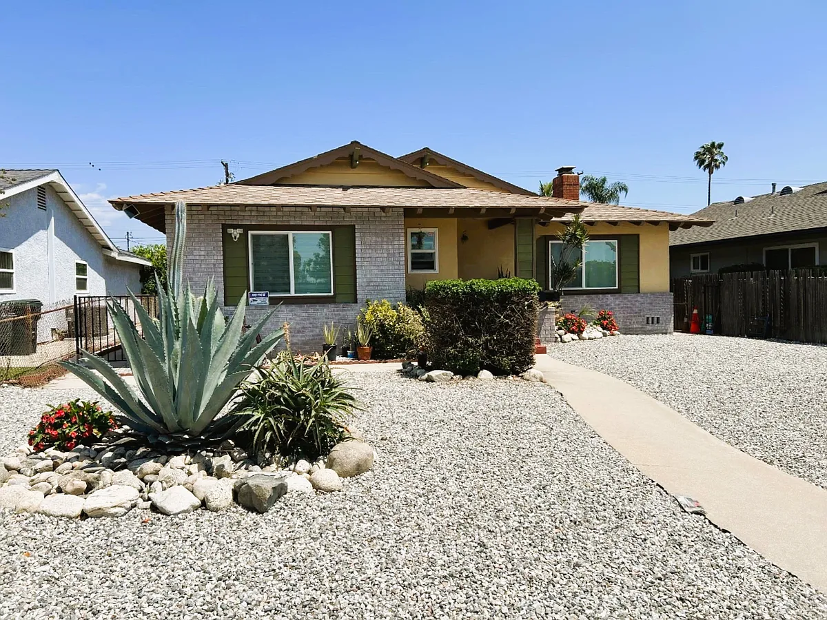 Front of the single-family home. - N Angeleno Ave