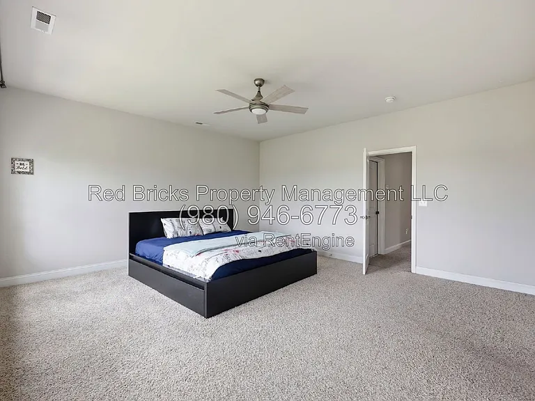 9659 Camberley Ave NW — Photo 27