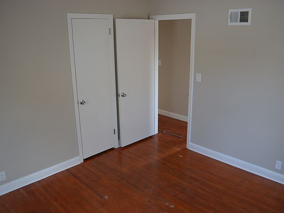 Upstairs bedrooms have hardwood floors and walk in closests