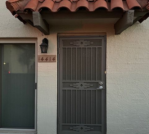 Front door with a security screen door