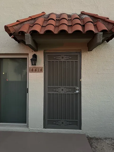 Front door with a security screen door