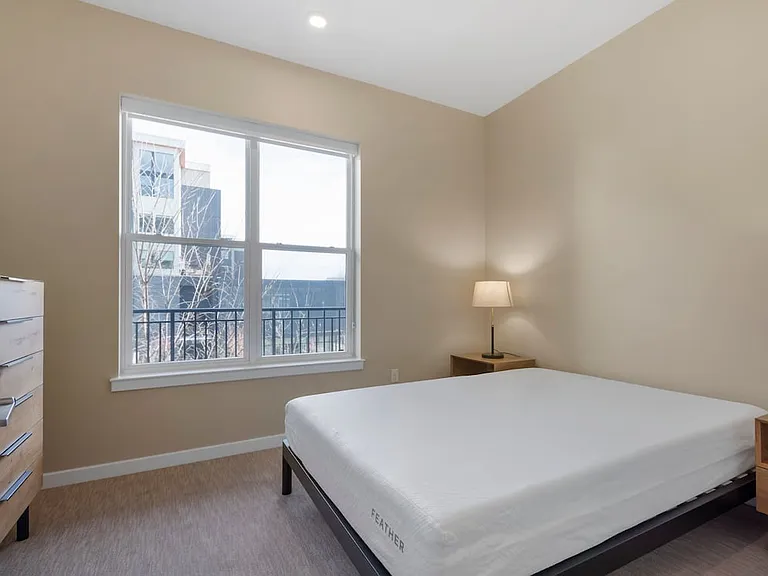 Furnished+ apartment homes feature queen bed with mattress, dresser, nightstands, and lamps (Representative Image exact items and style of furnishings may vary)