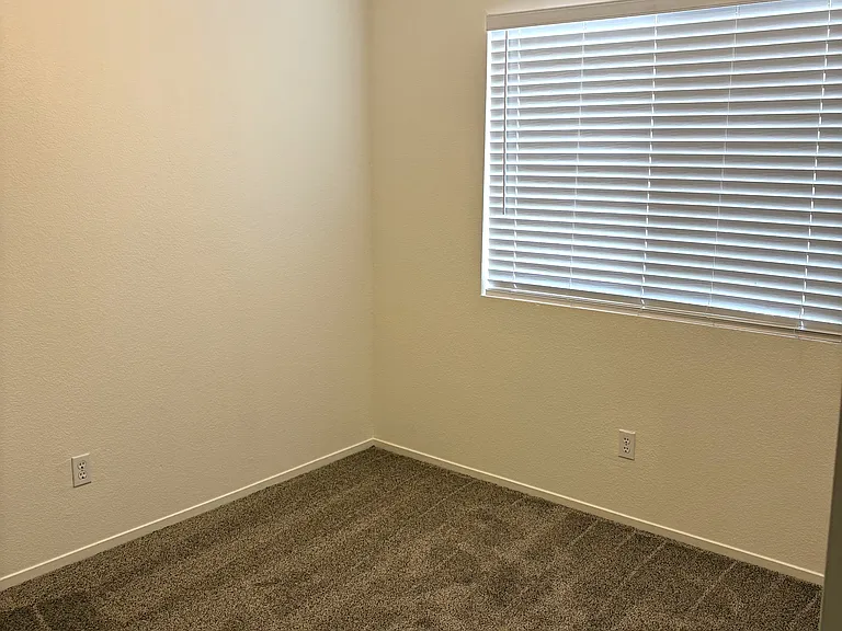 Secondary bedrooms with ceiling fans