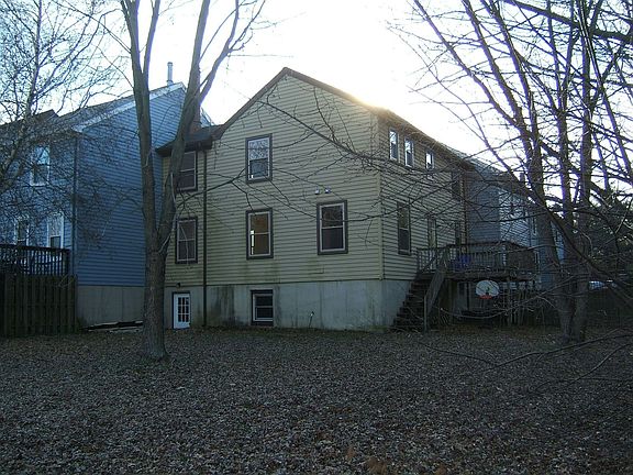 Rear view of home and Yard