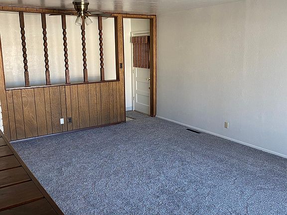 Living Room entrance (Side Door and entry to staircase in view)