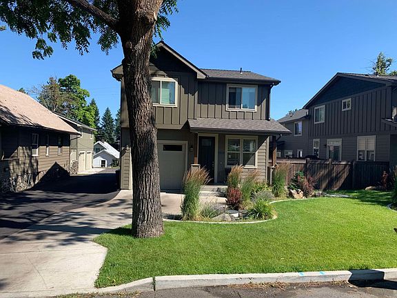 Front of property - 1025 E 30th located behind building to the right.