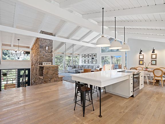 Living, dining and kitchen all open. Easily entertain or keep an eye on kiddos!